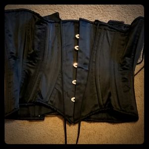Steel bonded never worn corset.